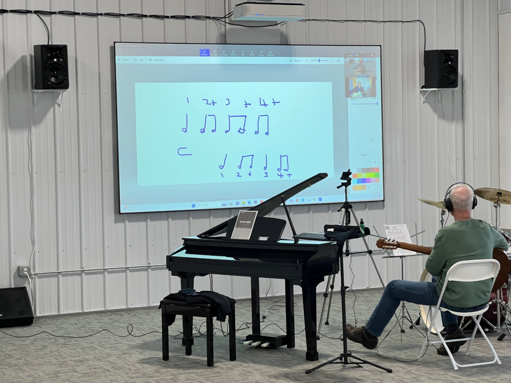 Guitar lesson in Room 1